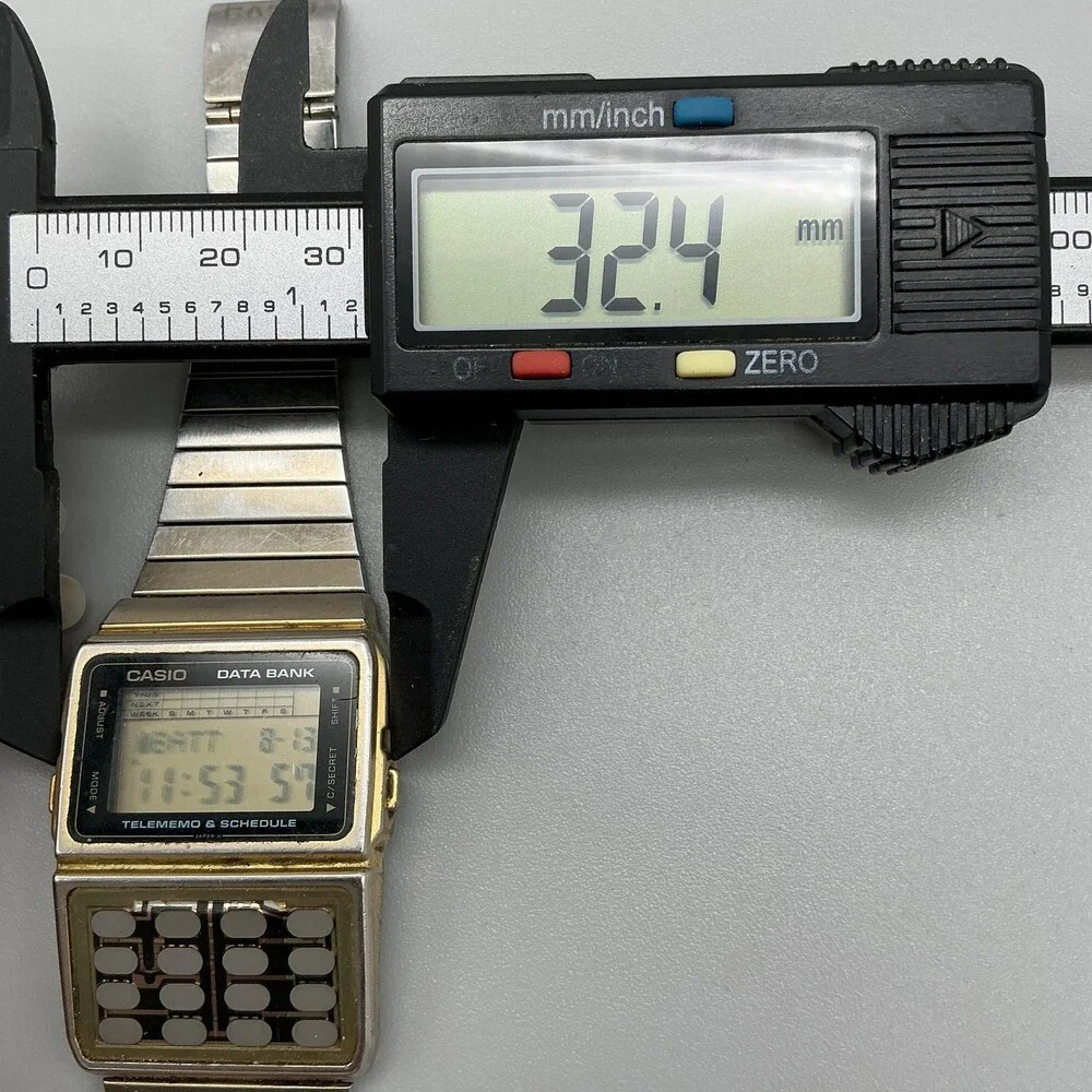 Vintage Casio DBC-610 Data Bank Mens Watch 32mm Gold Calculator Quartz Alarm